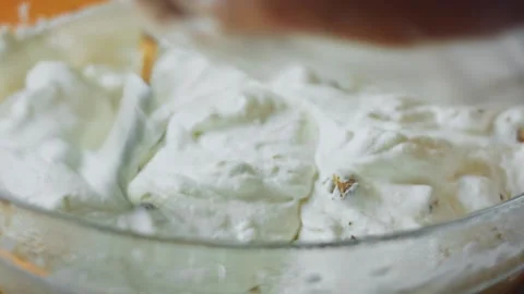 Close view of thick vanilla cream before freezing, 4K Stock Footage 341119350