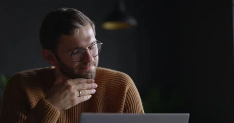 A close-up view of thoughtful serious man in eyeglass sit with laptop thinking 스톡 동영상 164674034