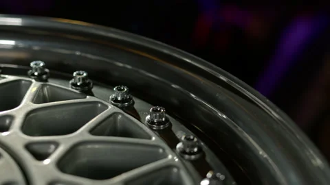 Close up view of three-piece forged wheels with classic pattern. Beautiful rims Stock Footage 194593975