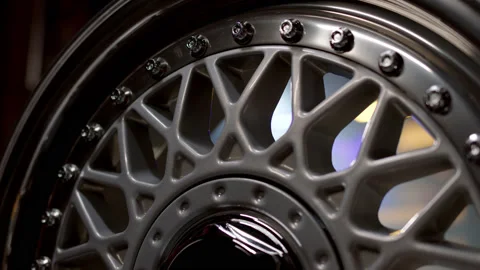 Close up view of three-piece forged silcer color wheels with classic pattern Stock Footage 195166791