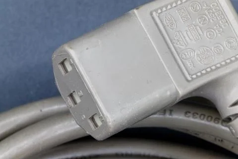 Close up view of a three-pin iec c13 power cable connector Stock Photos