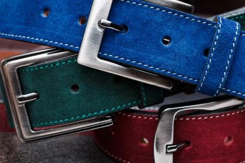 Close-up view of three suede belts Stock Photos
