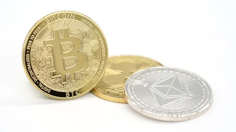 Close up view of three virtual gold and silver coins. Stock Footage 124808380