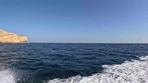 A close-view of Tidal waves captured from the boat over the deep blue waves Stock Footage 295907857