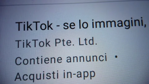 Close-up view of the Tik Tok icon app with an invitation to install it Stock Footage 159232868