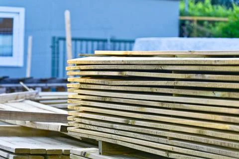 Close view of timber stacks bound together on pallets Stock Photos