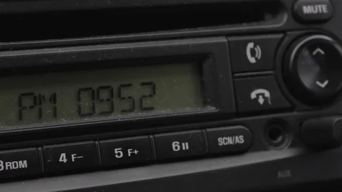 Close up view, time on car stereo clock Stock Footage 83690801