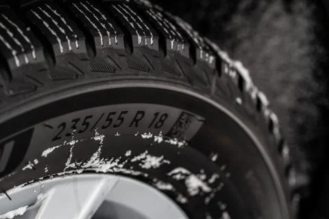 Close up view of tire with tire width, height and wheel diameter designation. Stock Photos