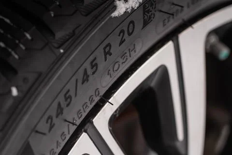 Close up view of tire with tire width, height and wheel diameter designation. Stock Photos