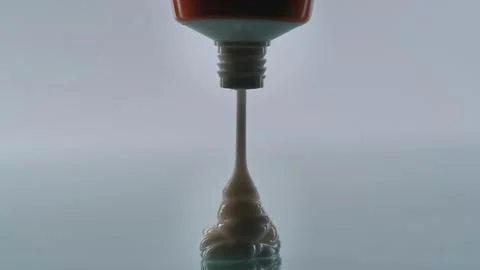 Close-up View of Toothpaste Being Squeezed from a Tube Stock Photos