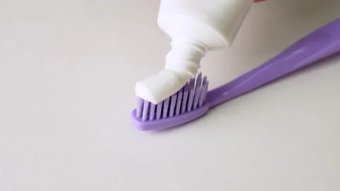 Close-up view of toothpaste with toothbrush Stock Footage 253536347