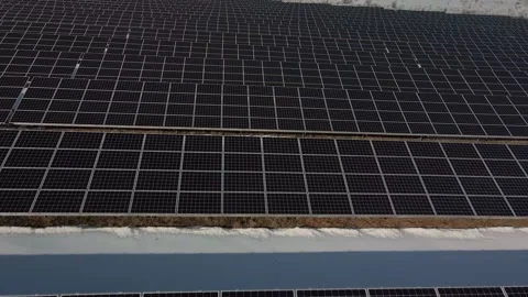 Close-up view from top on solar panels power station in desert at winter morning Stock Footage 155505297