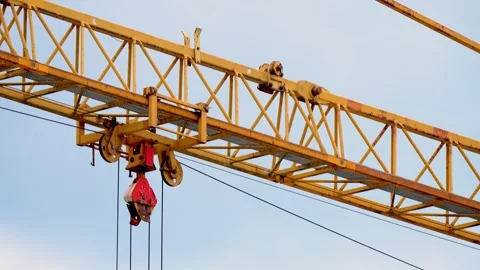 Close up view of Tower crane at construction site. Heavy machinery and Stock Footage 303710899
