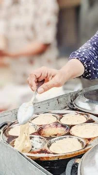 Close-up view. The traditional baking process of Khamir pancake Stock Photos