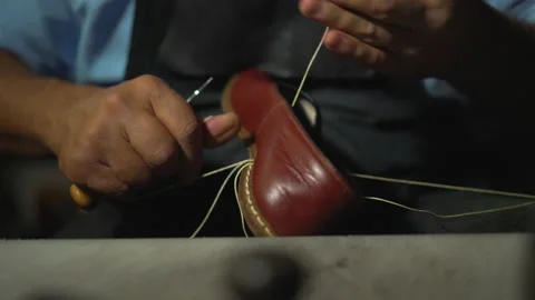 Close-up view of traditional shoe maker Stock Footage 146854890