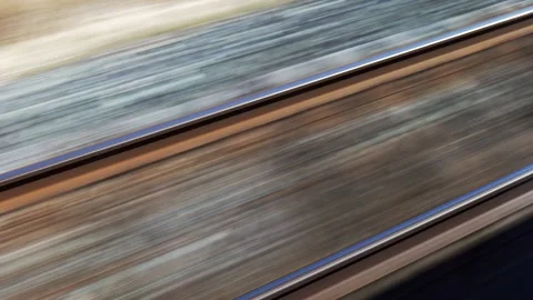 Close view of train tracks passing, from train window Stock Footage 192041137
