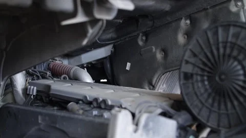 Close-up view of truck engine compartment showing air filter radiator hoses. Stock Footage 313815205