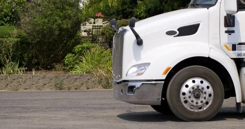 Close view of truck pulling away 4K Stock Footage 80157016