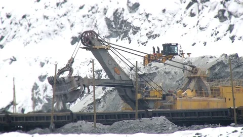 Close up view of trucks excavating in quarry. Mining operations. Stock Footage 119155532