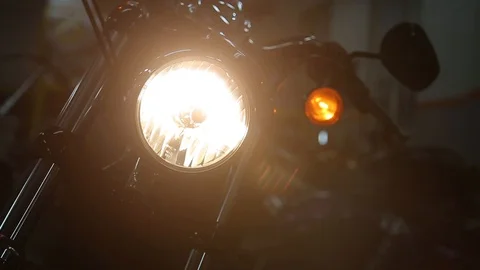 Close up view turned off headlight of motorcycle inside the garage. HD Stock Footage 125747773