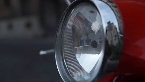 Close up view turned on headlight of retro bike at night. Stock Footage 108614121