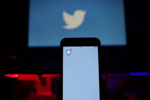 Close up view of the twitter logo on mobile phone Stock Photos
