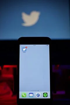 Close up view of the twitter logo on mobile phone Stock Photos