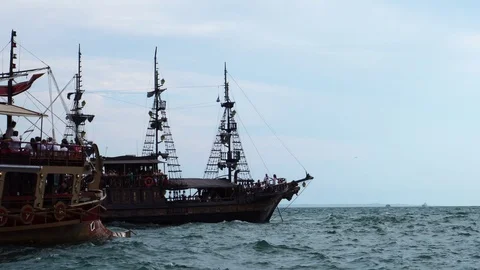 Close up view on two ancient retro sail ships tourist attractions meeting in Stock Footage 94996687