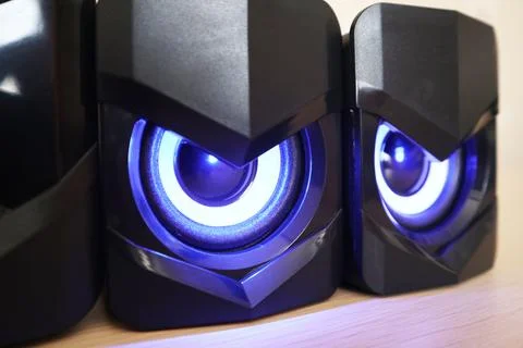 Close-up view of two black gaming computer speakers featuring aggressive ge.. Stock Photos