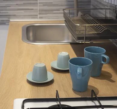 Close up view of two cups of coffee for breakfast on wooden  tabletop in kitc Stock Photos