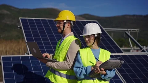Close up view of two engineer male and female wearing safety vest handshake with Stock Footage 289020714