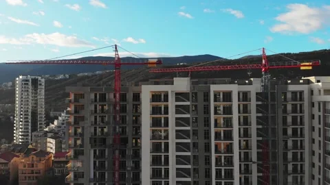 Close up view of two static cranes with new building under construction and s Stock-Footage 148334994