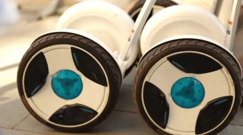 A close view to a two-wheeled, self-balancing, battery-powered electric vehicle  库存影片 62779245