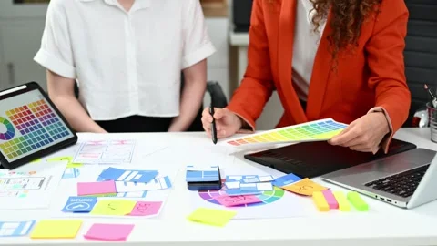 Close up view of UI developer team brainstorming on their project with lapt.. Stock Footage 312602768