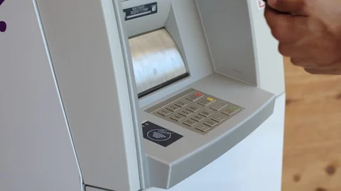 Close up view of unrecognizable Afro-American male hand withdrawing money from Stock Footage 112673061
