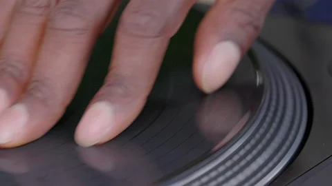 Close-up view of unrecognizable DJ playing recorded music Stock Footage 221151365