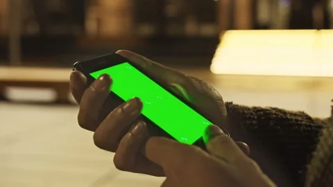 Close up view of unrecognizable hand holding vertically modern luxurious Stock Footage 156857407