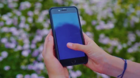 Close up view of unrecognizable person vertically using smartphone with blank Stock Footage 113045284