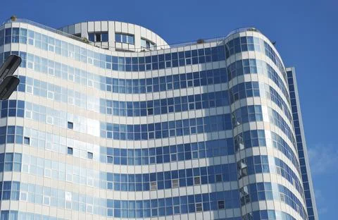 A close-up view of the upper portion of a modern multi-story business-class b 写真素材