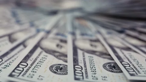 Close-up view of US dollar banknotes fanned out in a circular arrangement, Stock Footage 327698887