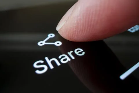 Close-up view of using the share function on a smartphone Stock Photos