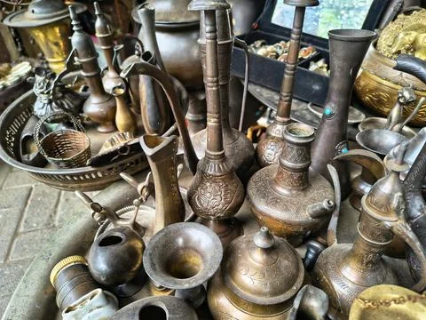 Close up view of various antique brass dan bronze wares Stock Photos