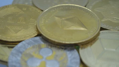 A close up view of various crypto coins. Stock Footage 157885775