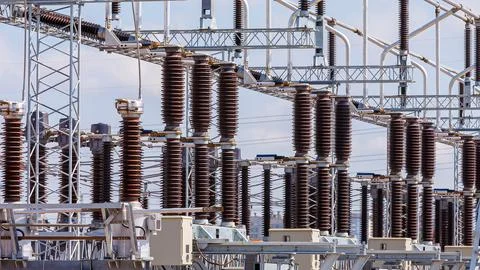 Close up view of various elements and high-voltage insulators of a transforme Stock Photos