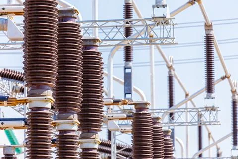 Close up view of various elements and high-voltage insulators of a transforme Stock Photos