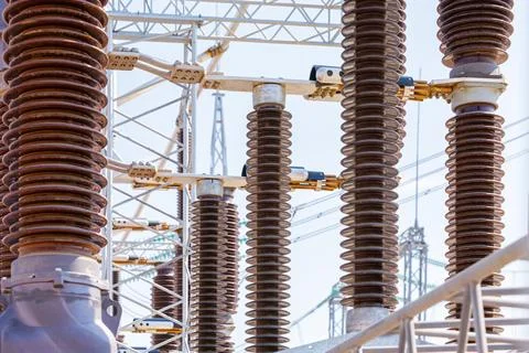 Close up view of various elements and high-voltage insulators of a transforme Stock Photos