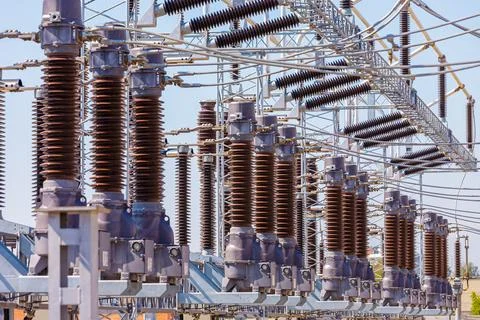 Close up view of various elements and high-voltage insulators of a transforme Stock Photos