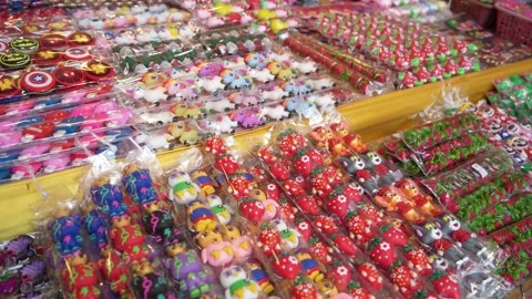 Close-up view of various types of key chains selling in the souvenir shop. 動画素材 252282953