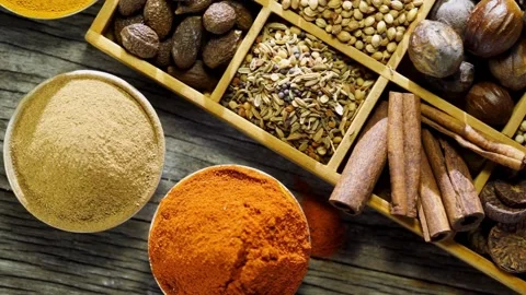 Close up view of various whole and ground spices Video stock 333809134