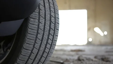 Close up view of vehicle tire on the ground. Stock Footage 80979047